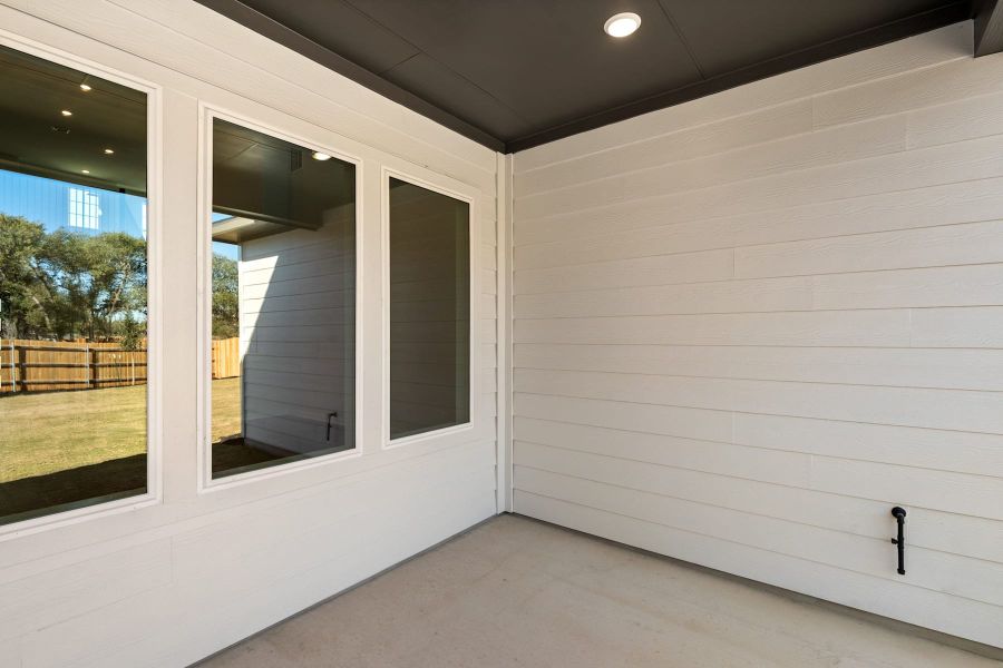 Exterior details and patio area of a home in Heritage, Dripping Springs (Image 4). Exterior details and patio area of a home in Heritage, Dripping Springs (Image 4).