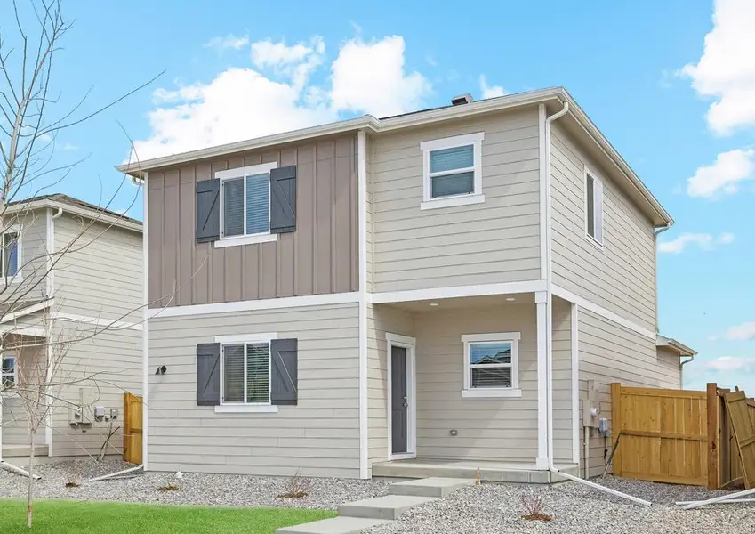 The Azalea is a beautiful two story home with siding.