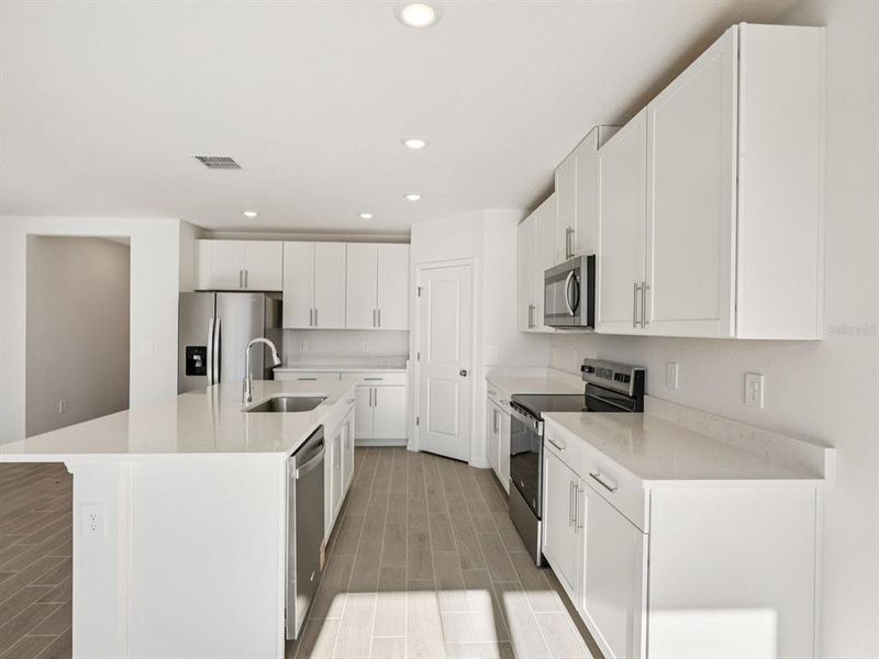 Furnished interior view inside a new home in Oakfield Trails - Classic Series, Parrish (Image 7).