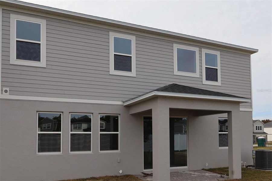 Exterior details and patio area of a home in Estates at Rivercrest, Sanford (Image 15). Exterior details and patio area of a home in Estates at Rivercrest, Sanford (Image 15).