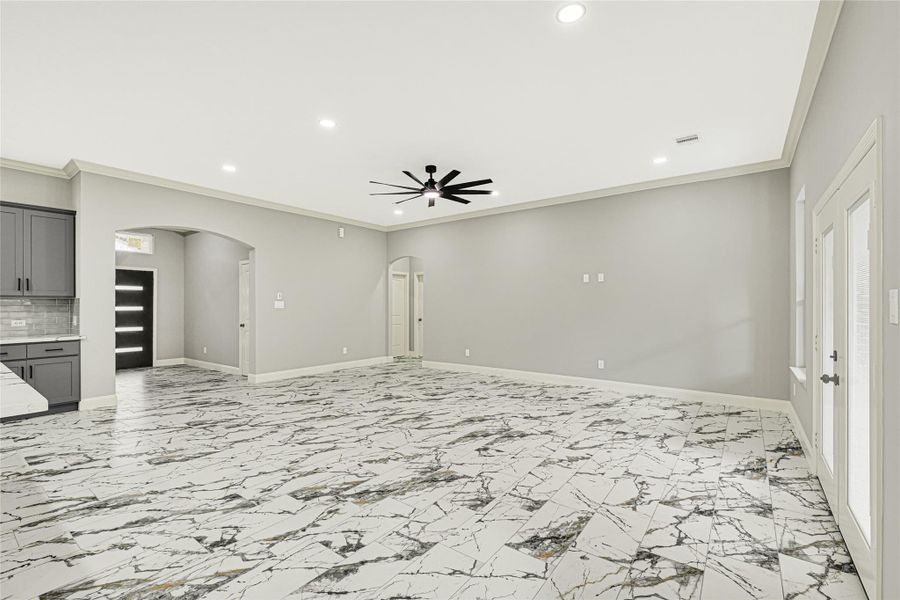 Step into this elegant and open living room with soaring 10 ft. ceilings throughout entire home. Step into this elegant and open living room with soaring 10 ft. ceilings throughout entire home.