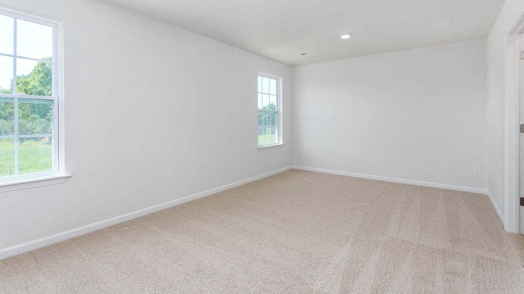 Spacious, unfurnished interior of a new home in The Gables at Edinborough Townes, Gibsonville (Image 13).