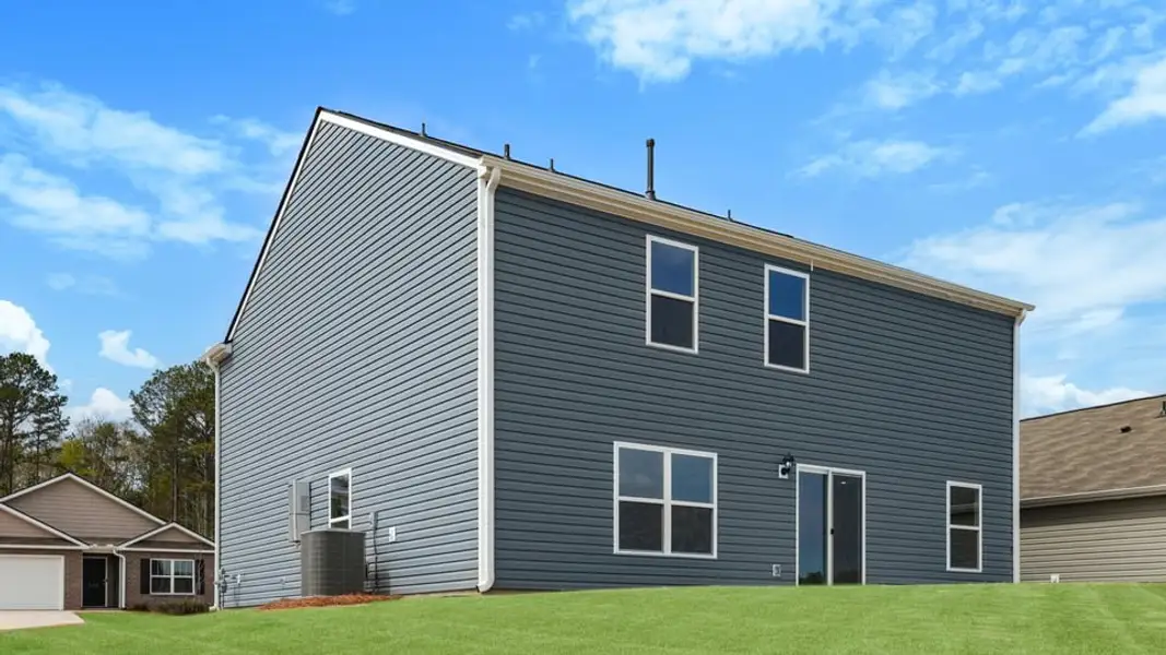 Exterior details and patio area of a home in Lakestone, Woodruff (Image 21).