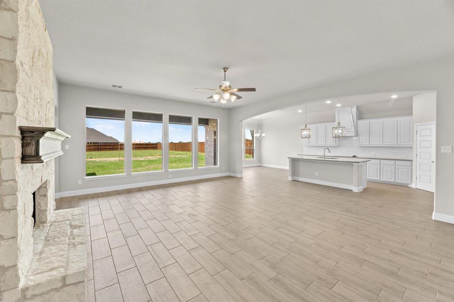 Family Room | Concept 2796 at Coyote Crossing in Godley, TX by Landsea Homes