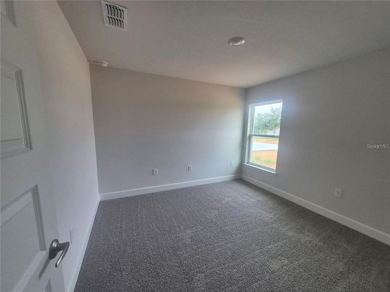 Spacious, unfurnished interior of a new home in Hill Country Estates, Dade City (Image 13).