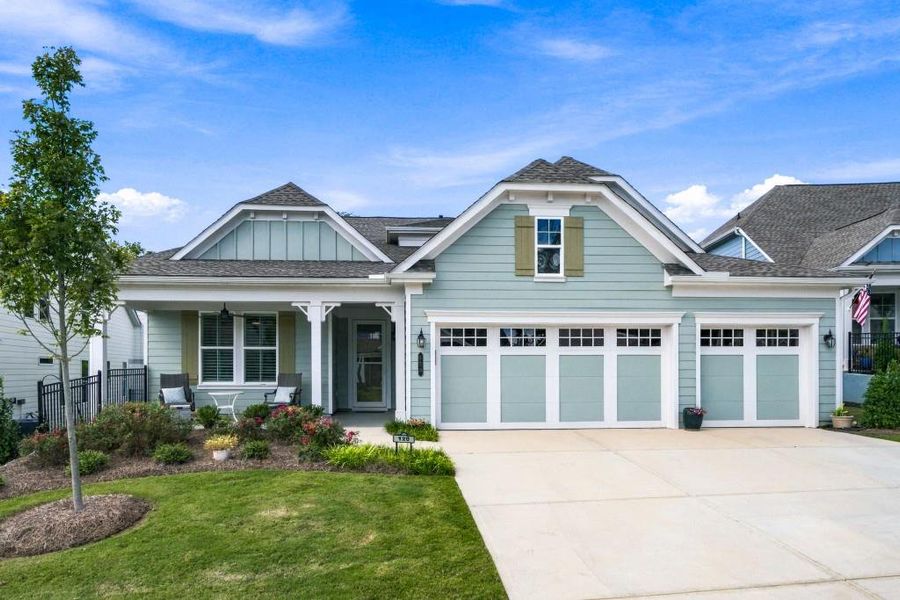 Front exterior of a new home in , Hoschton, GA, highlighting curb appeal (Image 24).