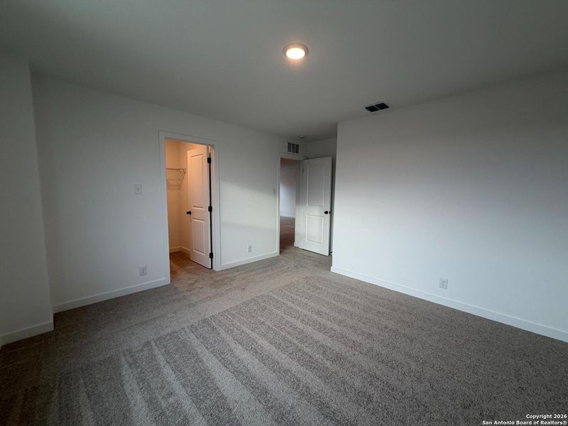 Spacious, unfurnished interior of a new home in The Preserve at the Wilder, Adkins (Image 18).