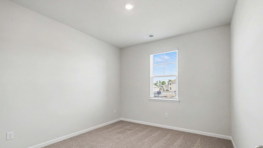 Spacious, unfurnished interior of a new home in Auberon Woods, Conway (Image 15).