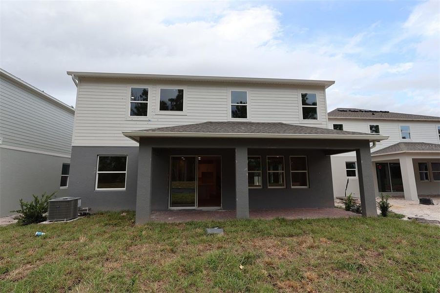 Exterior details and patio area of a home in Eden at Crossprairie, St. Cloud (Image 3).