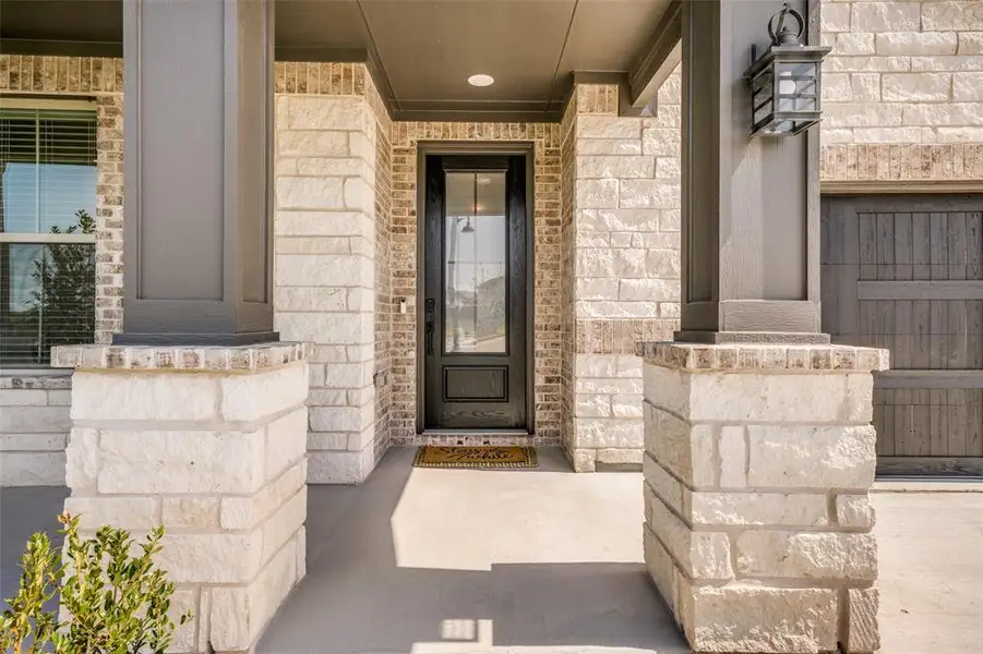 Exterior details and patio area of a home in , Little Elm (Image 3). Exterior details and patio area of a home in , Little Elm (Image 3).