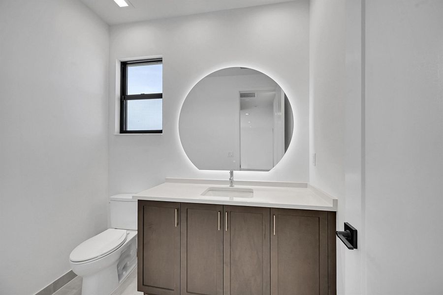 Furnished interior view inside a new home in Apex at Avenir, Palm Beach Gardens (Image 34).