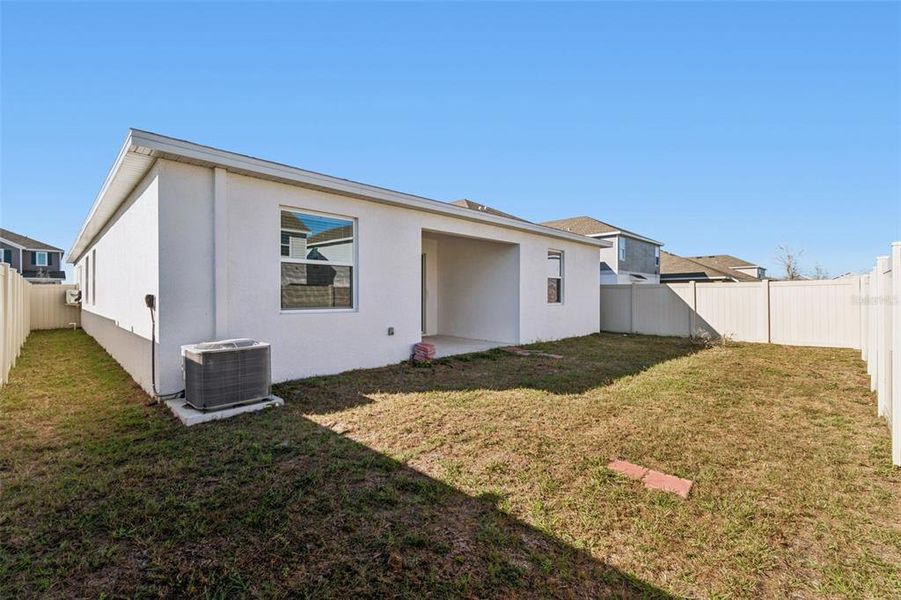 Exterior details and patio area of a home in Ranches at Lake McLeod, Eagle Lake (Image 30).