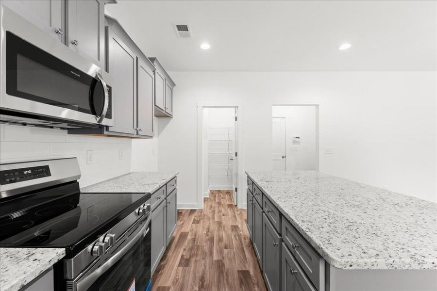 Furnished interior view inside a new home in , Statham (Image 8).