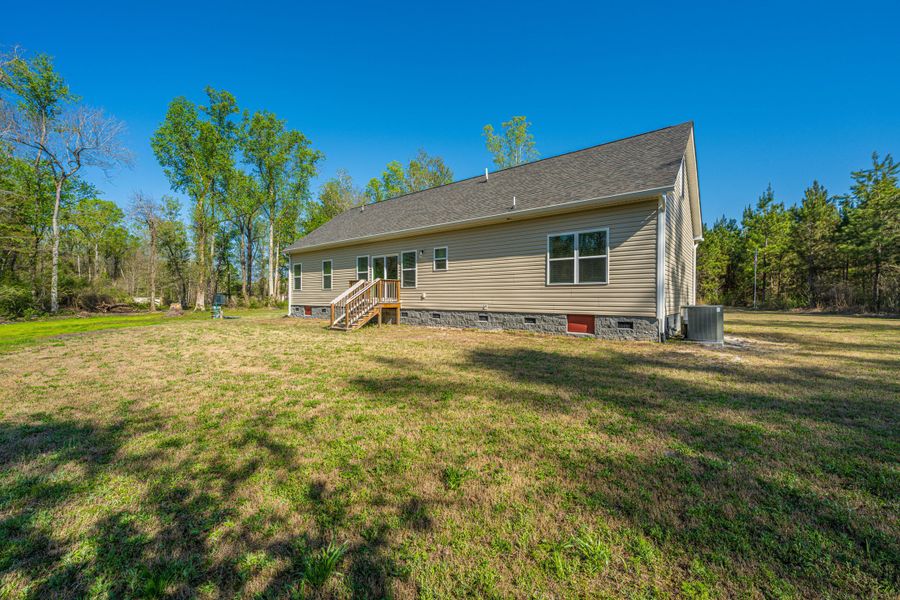 Exterior details and patio area of a home in , Cottageville (Image 21).