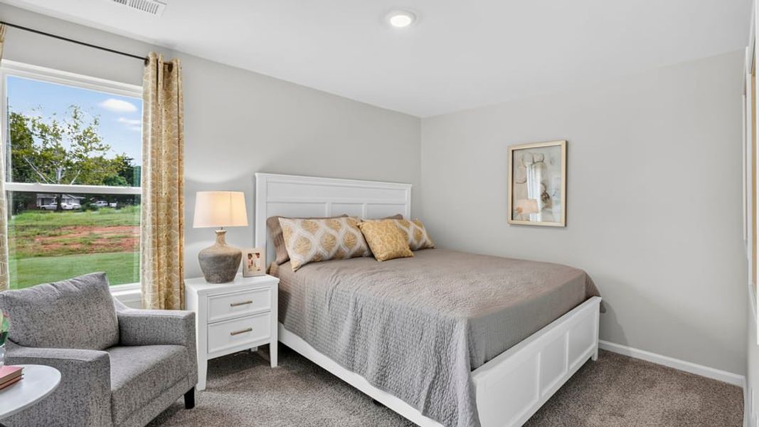Furnished interior view inside a new home in Village 3, Woodruff (Image 31).