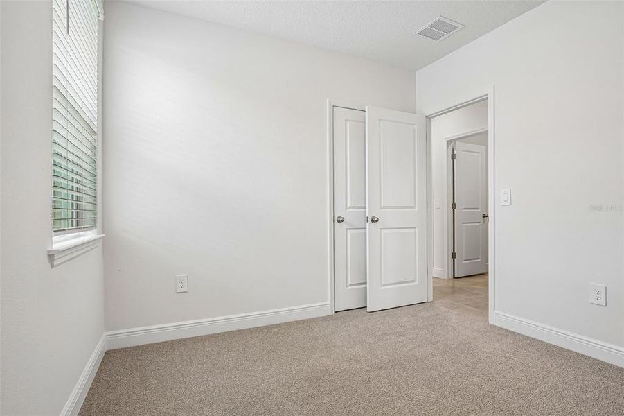 Spacious, unfurnished interior of a new home in The Reserve at Hammock Oaks - Classic Series, Lady Lake (Image 37). Spacious, unfurnished interior of a new home in The Reserve at Hammock Oaks - Classic Series, Lady Lake (Image 37).