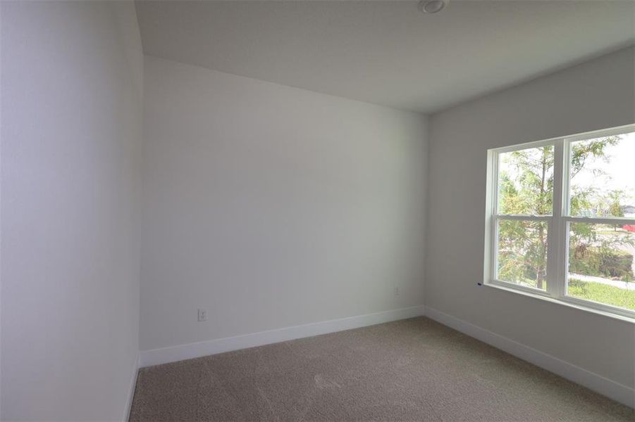 Spacious, unfurnished interior of a new home in The Peninsula at Rhodine Lake, Riverview (Image 27).