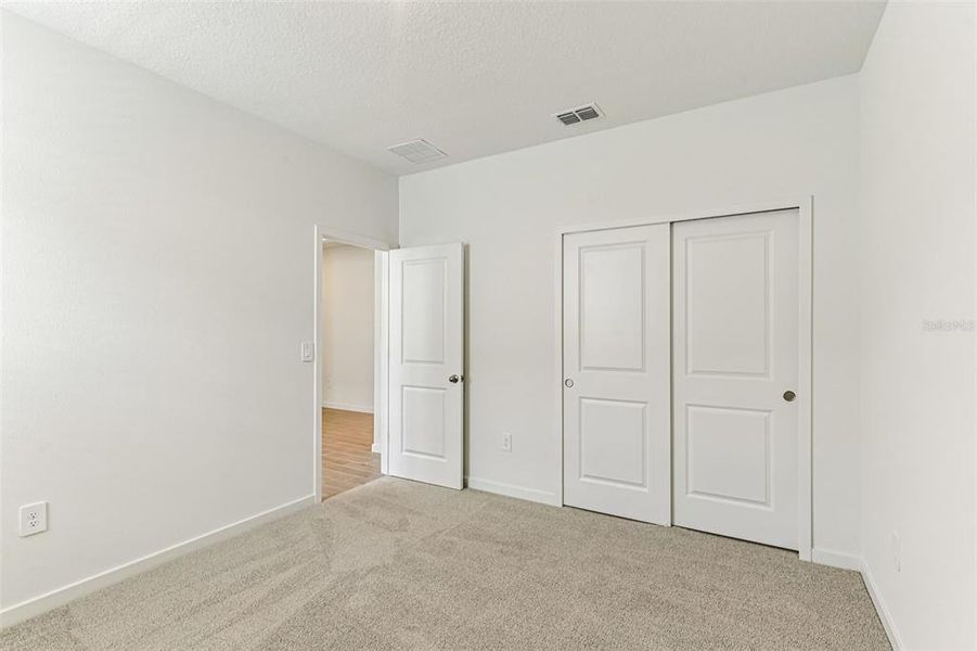 Spacious, unfurnished interior of a new home in Colbert Landings, Palm Coast (Image 28).