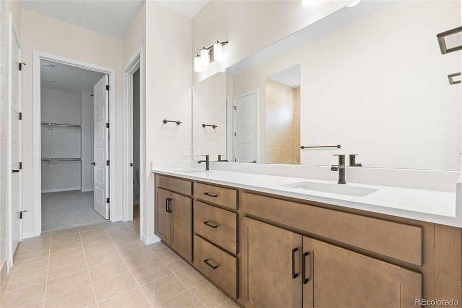 Furnished interior view inside a new home in Hilltop at Inspiration, Aurora (Image 12).