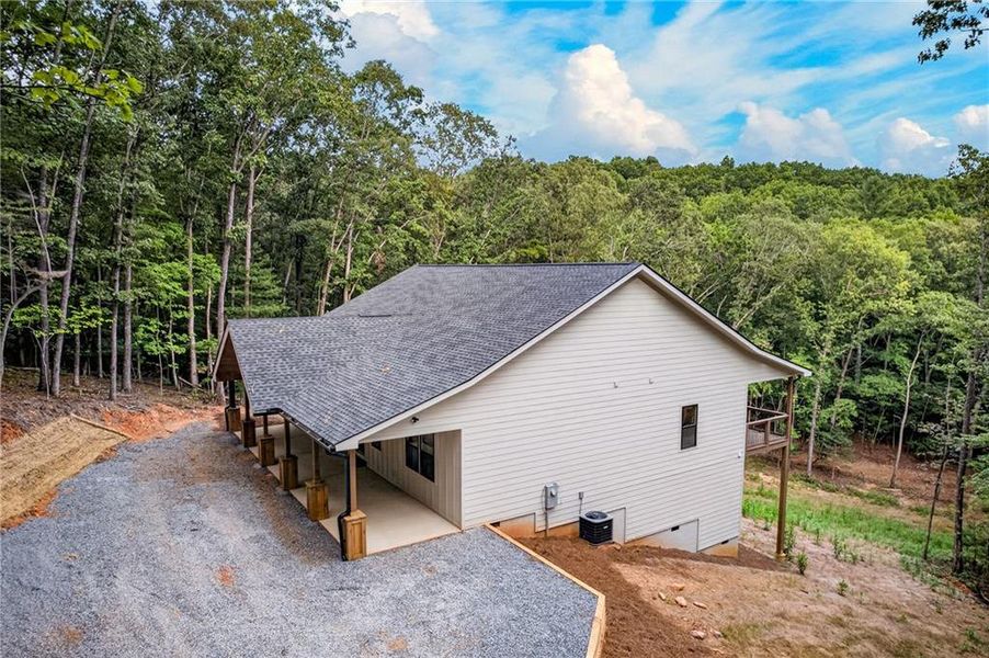Exterior details and patio area of a home in , Ellijay (Image 26).