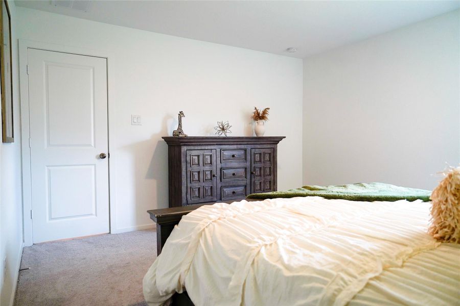 Furnished interior view inside a new home in Sunterra, Katy (Image 9).