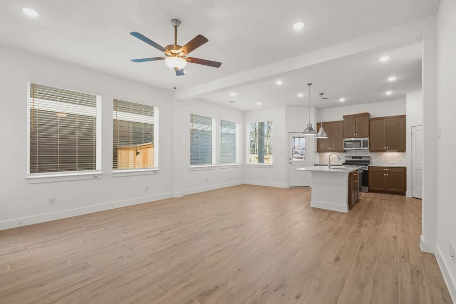 Representative unfurnished interior of a home built from the Cheverny by Chesmar Homes in Santa Rita Ranch, Liberty Hill (Image 8).