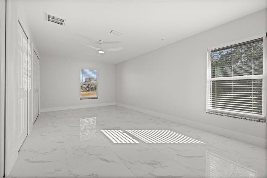 Spacious, unfurnished interior of a new home in , Port Charlotte (Image 21).