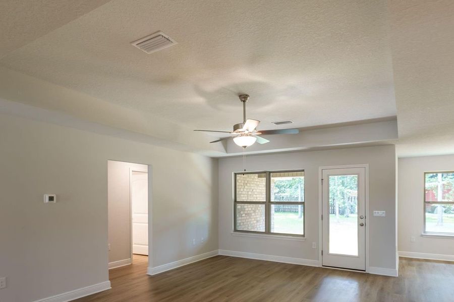 Representative unfurnished interior of a home built from the 2005 by Adams Homes in Parkland Place, Pace (Image 12).