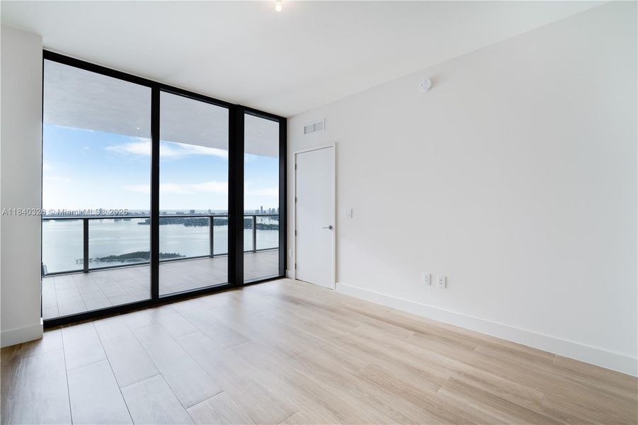 Spacious, unfurnished interior of a new home in Aria Reserve, Miami (Image 22). Spacious, unfurnished interior of a new home in Aria Reserve, Miami (Image 22).