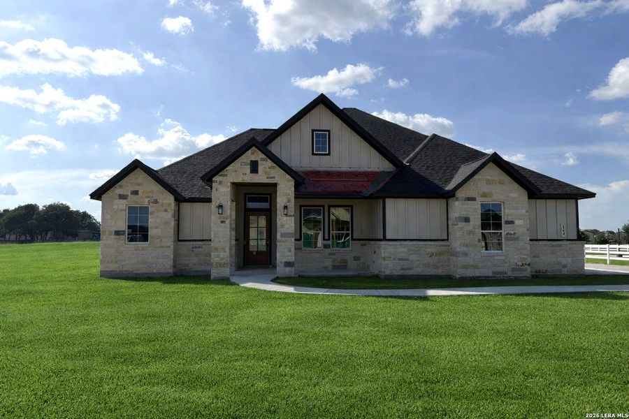 Front exterior of a new home in Pradera Ridge, Floresville, TX, highlighting curb appeal (Image 1). Front exterior of a new home in Pradera Ridge, Floresville, TX, highlighting curb appeal (Image 1).