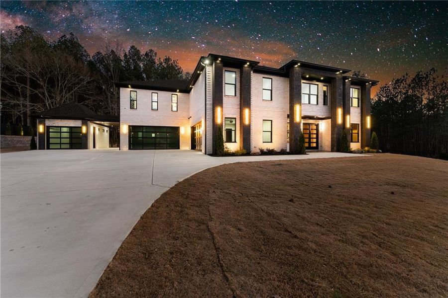 Front exterior of a new home in , Hoschton, GA, highlighting curb appeal (Image 38).