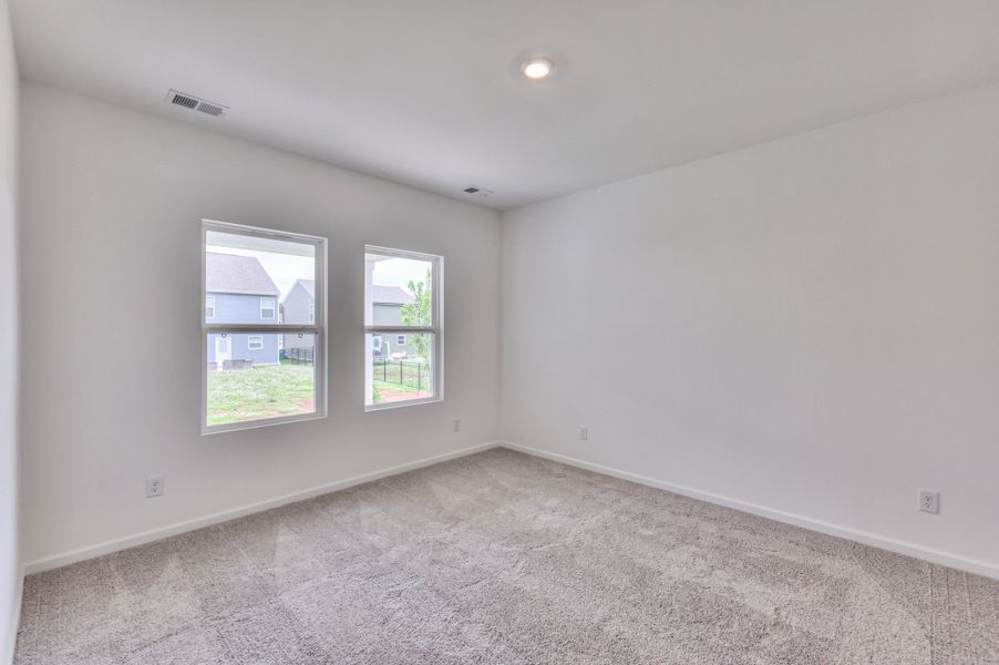 *Photo of example home. Selections & Finishes May Vary.