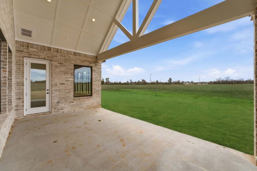 Exterior details and patio area of a home in The Manors, New Waverly (Image 27). Exterior details and patio area of a home in The Manors, New Waverly (Image 27).