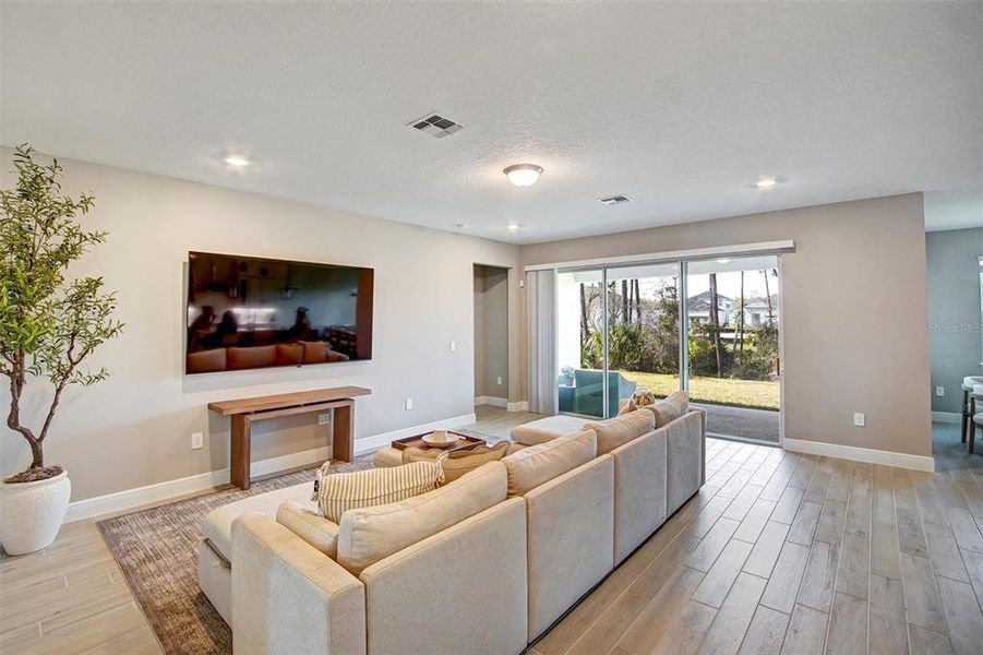 Furnished interior view inside a new home in Legends Preserve - Reserve Series, Daytona Beach (Image 9).