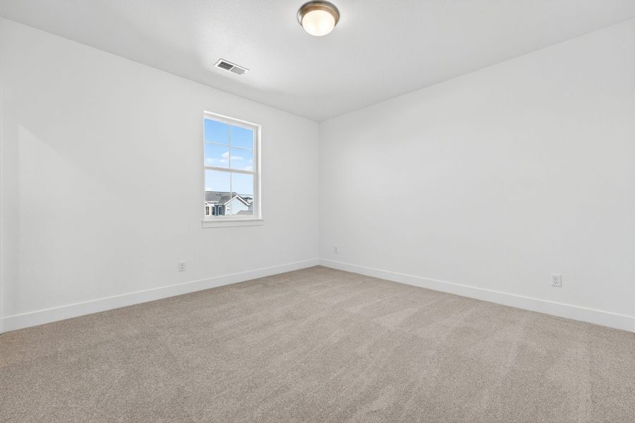 Spacious, unfurnished interior of a new home in Trailstone, Arvada (Image 22).