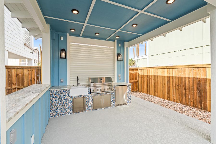 View of patio / terrace featuring area for grilling and a sink View of patio / terrace featuring area for grilling and a sink