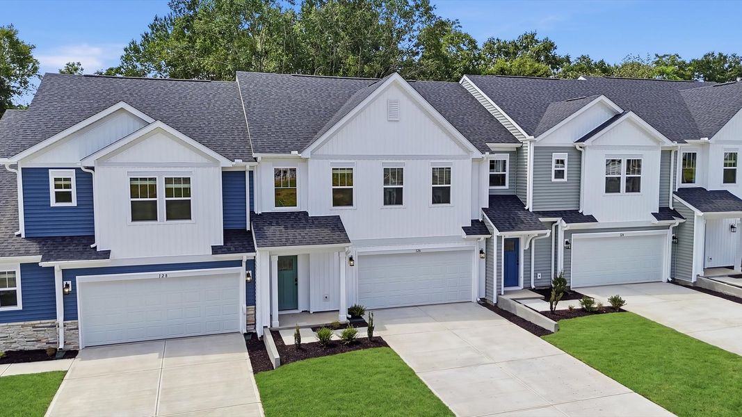 Eye-catching exterior with timeless color palette and superior architectural detail by DRB Homes Eye-catching exterior with timeless color palette and superior architectural detail by DRB Homes