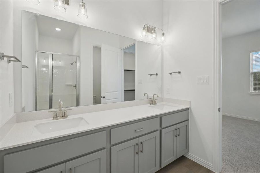 Bathroom with vanity and walk in shower