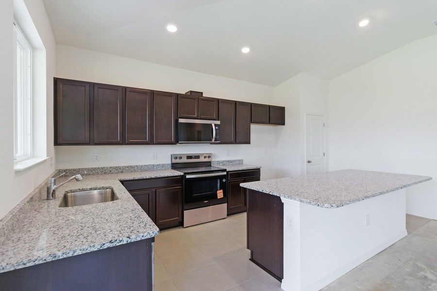 Furnished interior view inside a new home in Coves of Estero Bay, Fort Myers (Image 3).