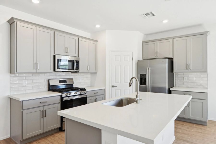 Kitchen featuring the Milan Collection. Not actual home, finishes may vary. Kitchen featuring the Milan Collection. Not actual home, finishes may vary.