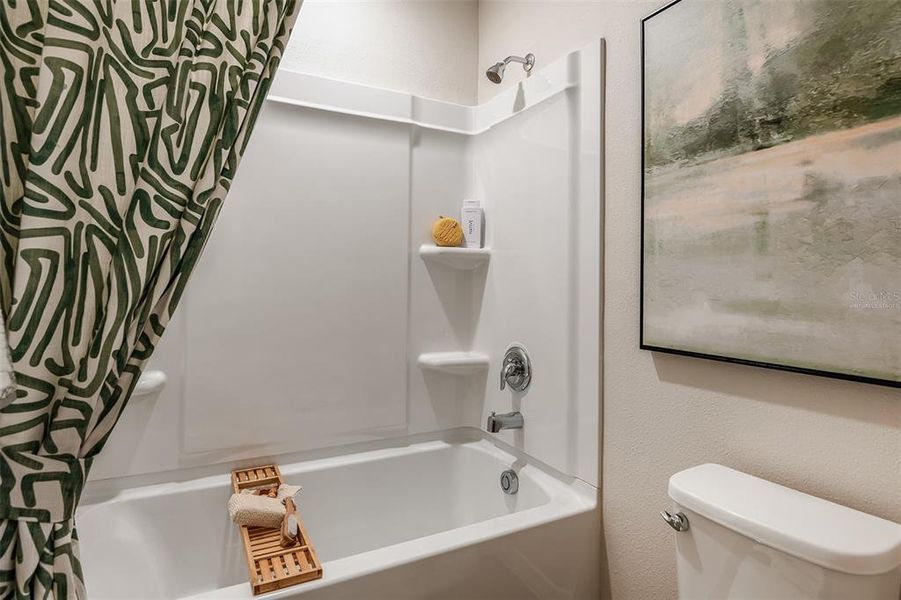 Furnished interior view inside a new home in Grove at Crosswind, Haines City (Image 18).