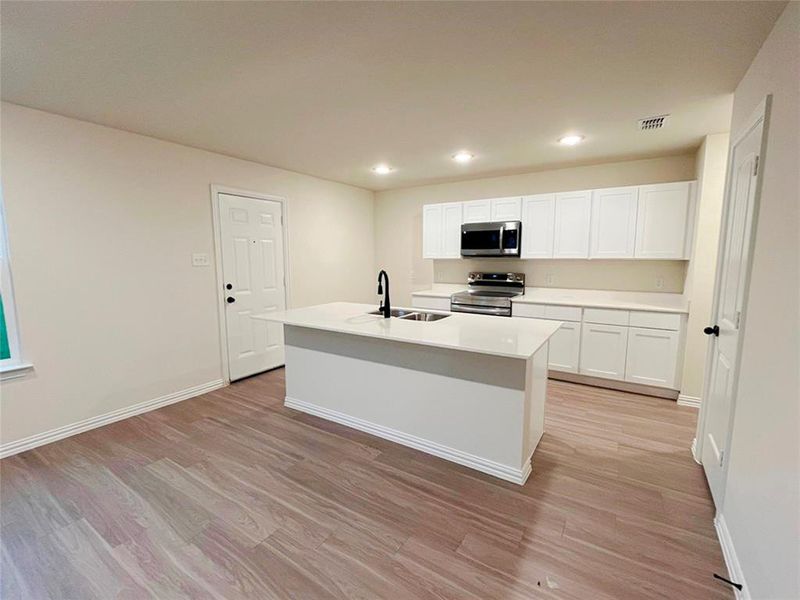 Furnished interior view inside a new home in Labein Villas, Greenville (Image 8).