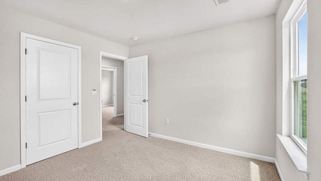 Spacious, unfurnished interior of a new home in Tyger Pines, Moore (Image 32).