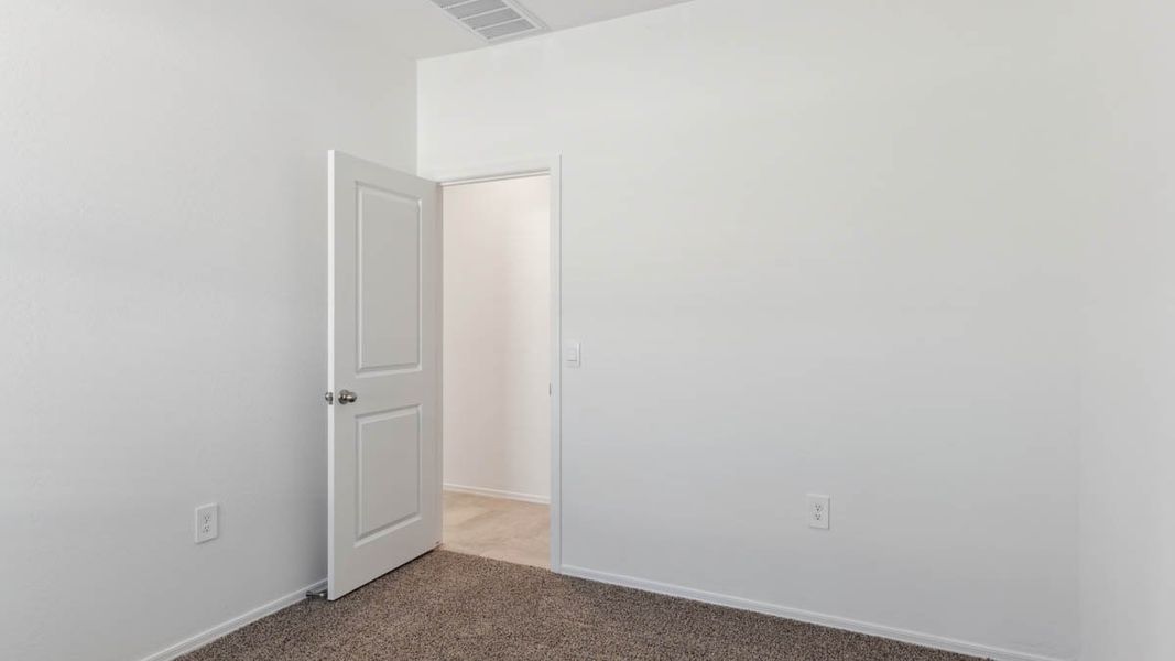 Spacious, unfurnished interior of a new home in Radiance at Superstition Vistas, Apache Junction (Image 19).