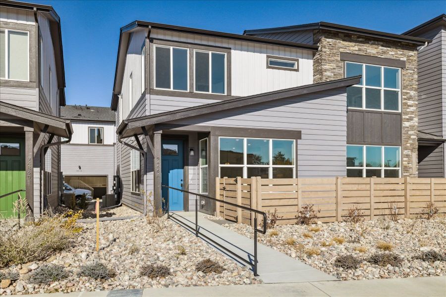 Front exterior of a new home in Ralston Creek, Arvada, CO, highlighting curb appeal (Image 1). Front exterior of a new home in Ralston Creek, Arvada, CO, highlighting curb appeal (Image 1).