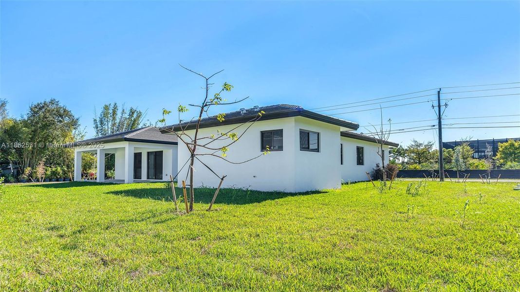 Front exterior of a new home in , Miami, FL, highlighting curb appeal (Image 28).