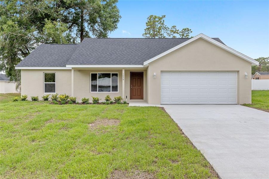 Front exterior of a new home in , Dunnellon, FL, highlighting curb appeal (Image 24). Front exterior of a new home in , Dunnellon, FL, highlighting curb appeal (Image 24).