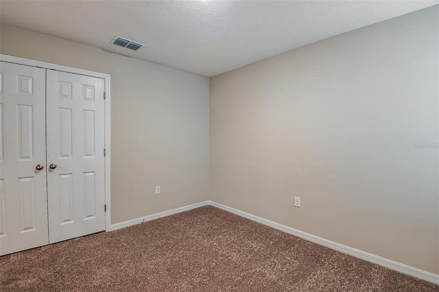 Spacious, unfurnished interior of a new home in Lawson Dunes, Haines City (Image 28). Spacious, unfurnished interior of a new home in Lawson Dunes, Haines City (Image 28).