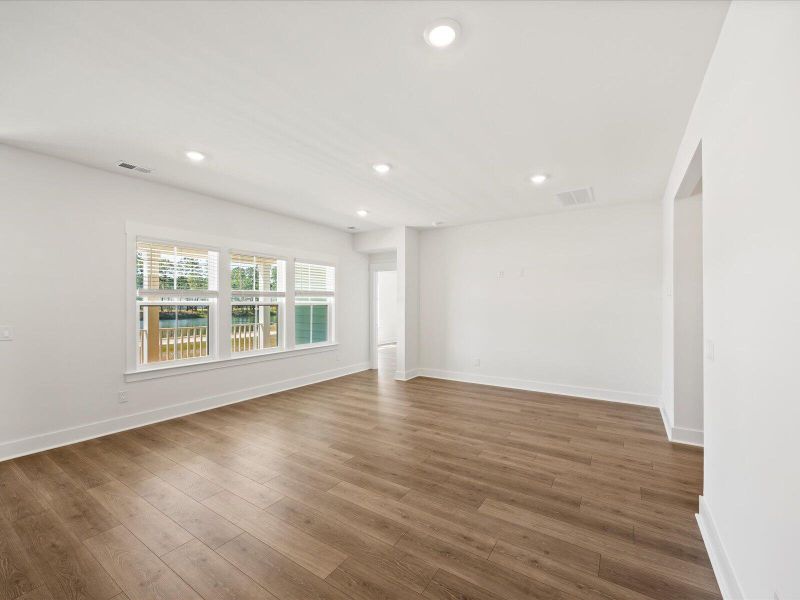 Spacious, unfurnished interior of a new home in The Coves at Lakes of Cane Bay II, Summerville (Image 15).