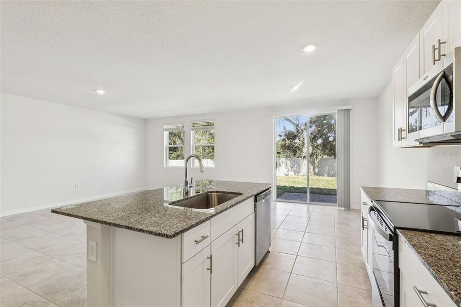 Furnished interior view inside a new home in Bradbury Creek - Signature Series, Haines City (Image 7).